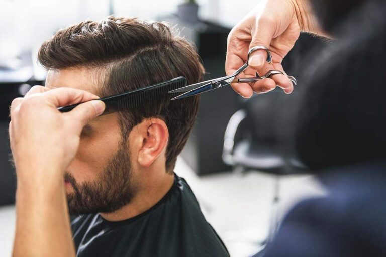Person with varied bang styles shown in a salon mirror, including curtain, blunt, wispy, and side-swept fringe.